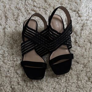 Maripe black heeled sandals with subtle sequin detail.